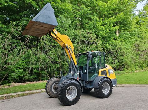 compact excavators wheel loaders|compact articulated wheel loaders.